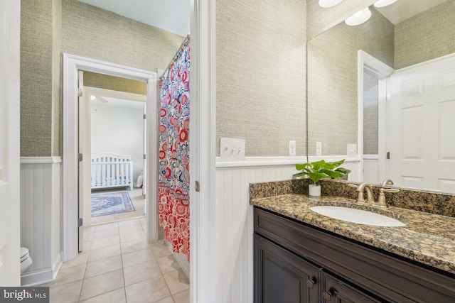 2042 Drovers Ln, Cooksville, MD 21723 - full bath with wallpapered walls, vanity, tile patterned flooring, curtained shower, and toilet