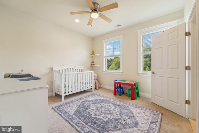 2042 Drovers Ln, Cooksville, MD 21723 - bedroom featuring carpet floors, baseboards, a crib, and a ceiling fan