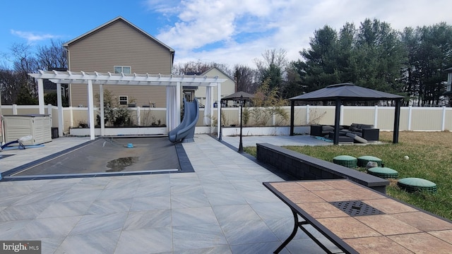 2042 Drovers Ln, Cooksville, MD 21723 - fenced backyard with a pergola, a patio, a gazebo, and an outdoor hangout area