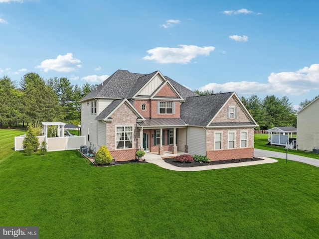 2042 Drovers Ln, Cooksville, MD 21723 - craftsman inspired home featuring covered porch, brick siding, board and batten siding, and a front yard