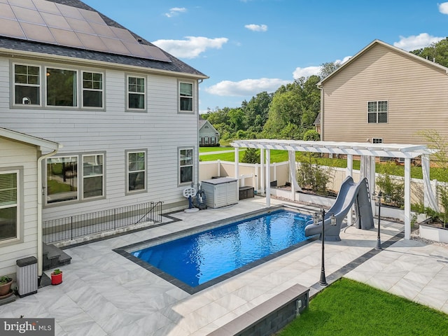 2042 Drovers Ln, Cooksville, MD 21723 - view of pool with a water slide, a pergola, a patio area, and a fenced backyard