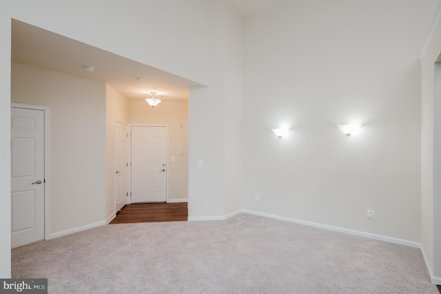 5207 Wyndholme Cir Unit 402, Baltimore, MD 21229 - unfurnished room with baseboards and carpet floors