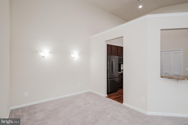 5207 Wyndholme Cir Unit 402, Baltimore, MD 21229 - unfurnished room with baseboards, dark colored carpet, recessed lighting, and vaulted ceiling
