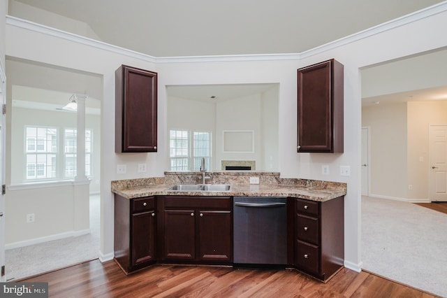 5207 Wyndholme Cir Unit 402, Baltimore, MD 21229 - kitchen with dishwasher, dark brown cabinetry, decorative columns, and a sink