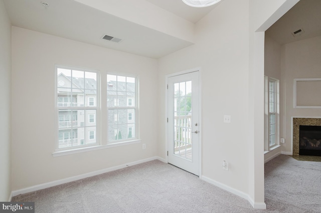 5207 Wyndholme Cir Unit 402, Baltimore, MD 21229 - doorway featuring baseboards, carpet flooring, and visible vents