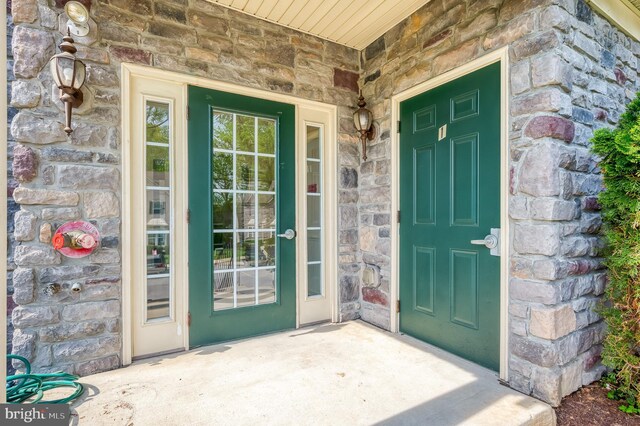 5207 Wyndholme Cir Unit 402, Baltimore, MD 21229 - entrance to property featuring stone siding
