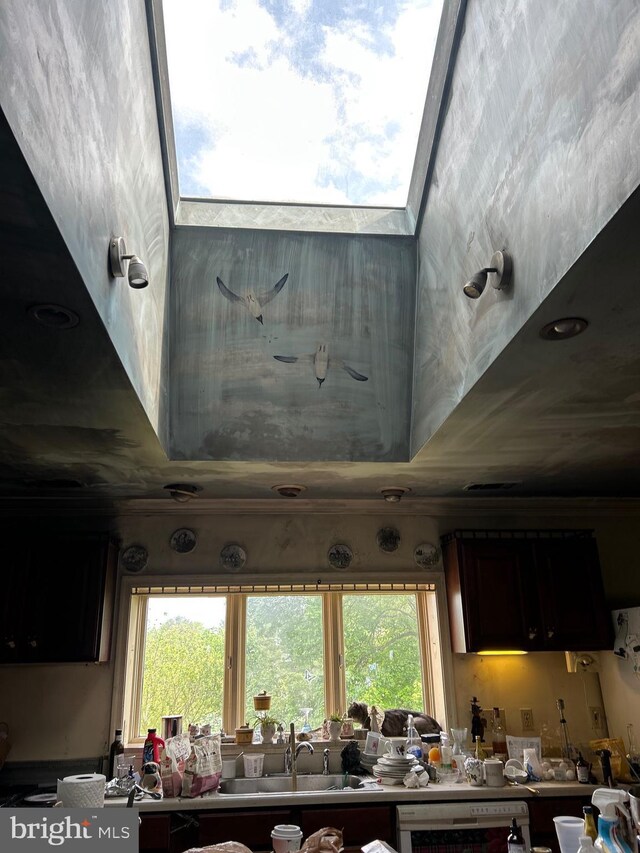 kitchen with dishwasher and a sink