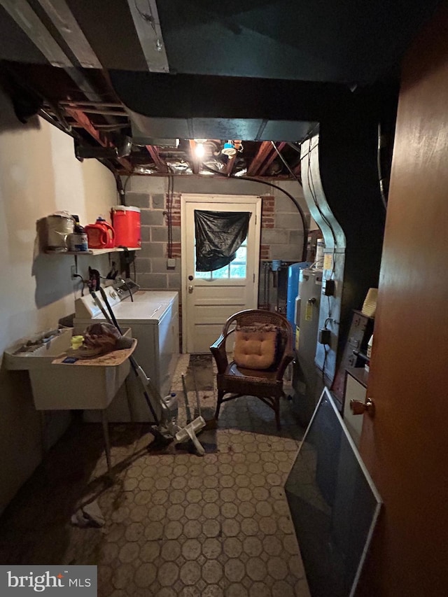 unfinished below grade area with independent washer and dryer