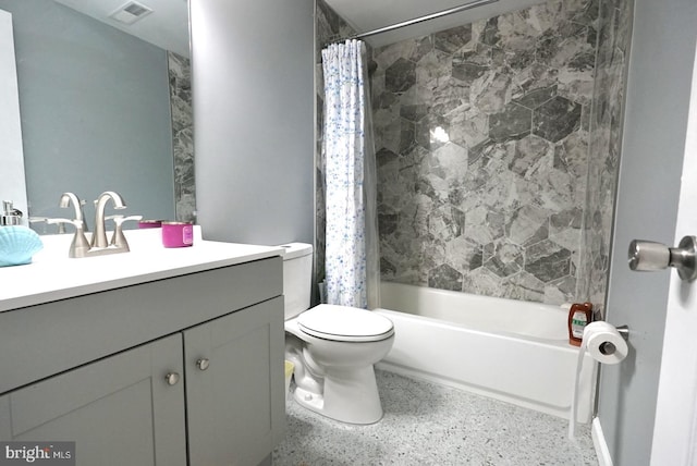 full bathroom with vanity, toilet, speckled floor, visible vents, and shower / bath combo with shower curtain