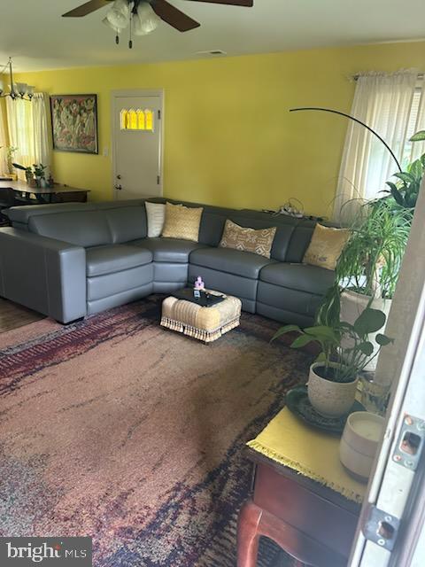 9011 Spring Acres Rd, Clinton, MD 20735 - living area with a ceiling fan