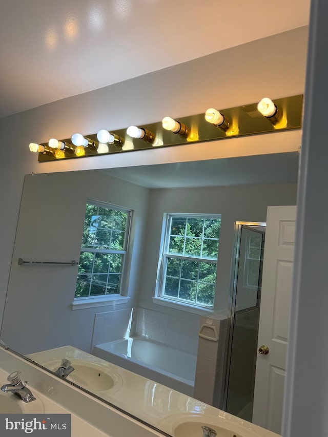 6 Chriswell Ct, Rosedale, MD 21237 - bathroom with a sink, a bath, and a stall shower