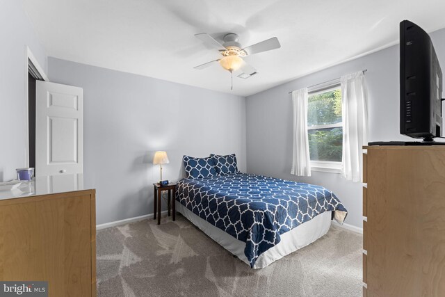 9801 Pulham Rd, Burke, VA 22015 - carpeted bedroom featuring baseboards and ceiling fan