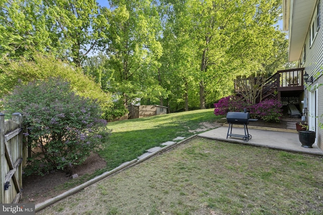 9801 Pulham Rd, Burke, VA 22015 - view of yard featuring a patio area, a wooden deck, and fence
