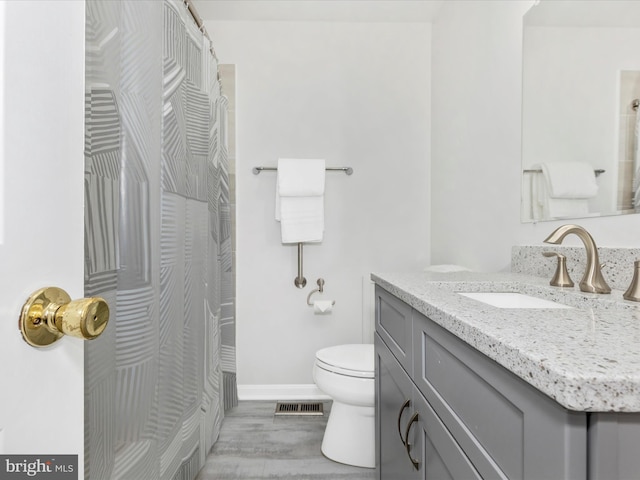 200 Magers Dr, Westminster, MD 21158 - bathroom with vanity, wood finished floors, and curtained shower