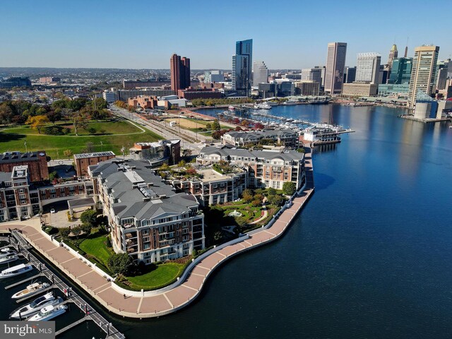 aerial view featuring a water view and a view of city