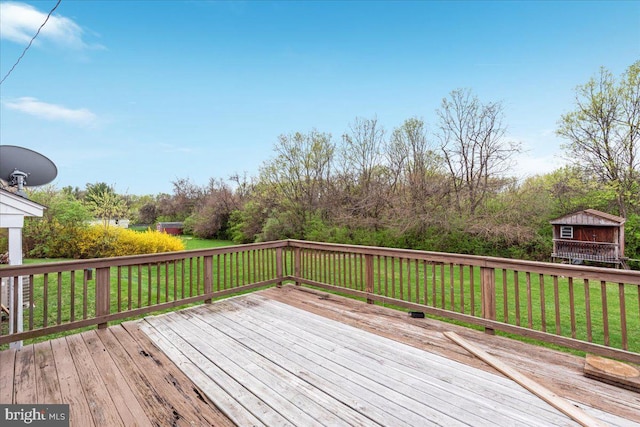 deck featuring a lawn
