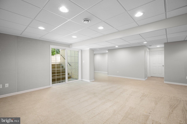 interior space featuring light carpet, baseboards, and recessed lighting