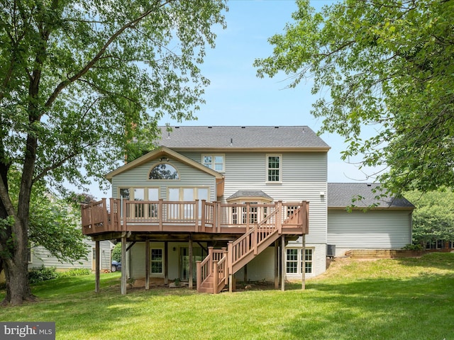 21 Griswold Ct, Sterling, VA 20165 - back of property with a deck, stairs, and a yard