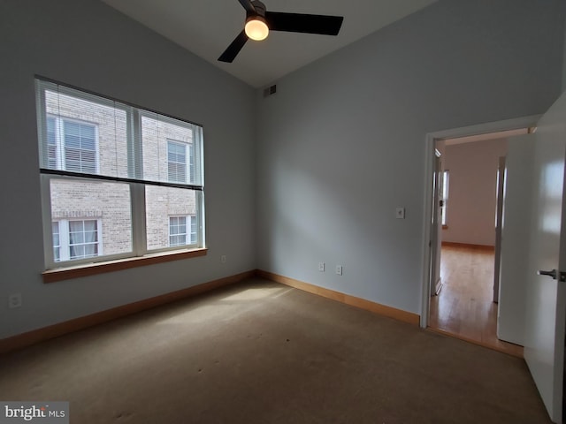 326 8th St NE Unit 402, Washington, DC 20002 - empty room featuring carpet floors, baseboards, and ceiling fan