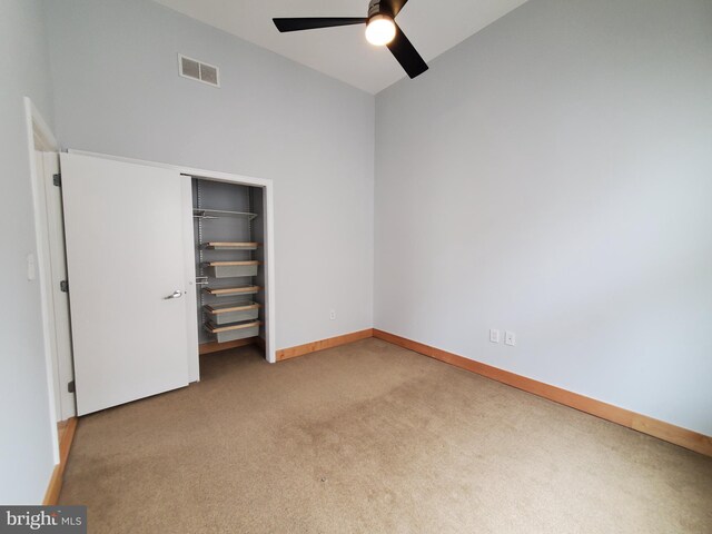 326 8th St NE Unit 402, Washington, DC 20002 - unfurnished bedroom with carpet floors, a closet, baseboards, and ceiling fan