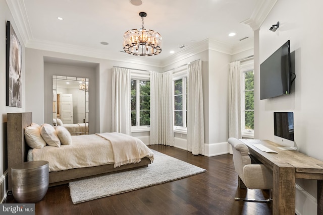 bedroom featuring a notable chandelier, multiple windows, and dark wood finished floors