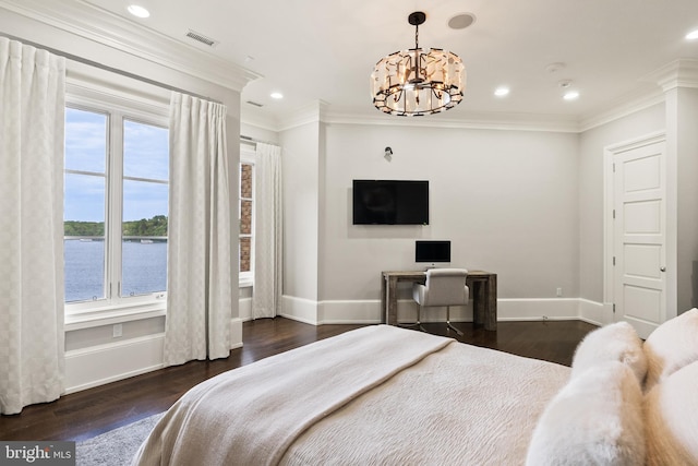 bedroom with a notable chandelier, baseboards, and dark wood finished floors