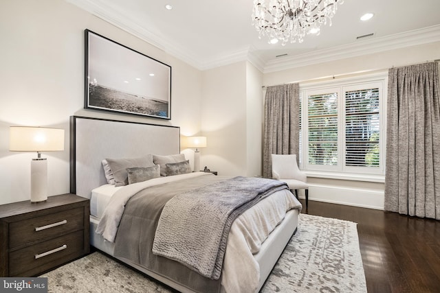 bedroom featuring an inviting chandelier, ornamental molding, wood finished floors, and recessed lighting