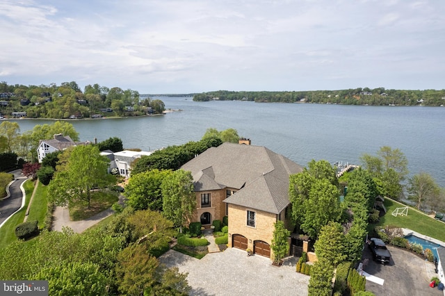 birds eye view of property featuring a water view