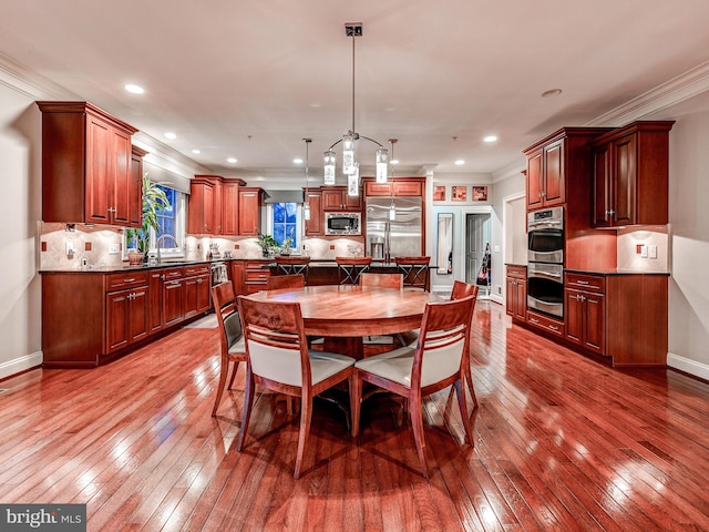 6 Paladia Way, Pikesville, MD 21208 - dining room with baseboards, ornamental molding, recessed lighting, and light wood-style floors