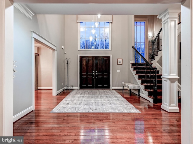 6 Paladia Way, Pikesville, MD 21208 - entrance foyer with a high ceiling, baseboards, stairs, and wood finished floors