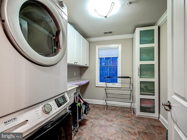 6 Paladia Way, Pikesville, MD 21208 - laundry room featuring crown molding, stacked washing maching and dryer, baseboards, visible vents, and cabinet space