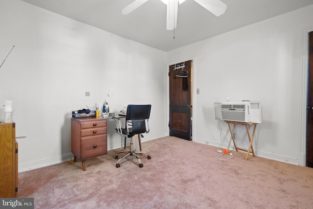 office with baseboards, a wall mounted AC, carpet flooring, and ceiling fan