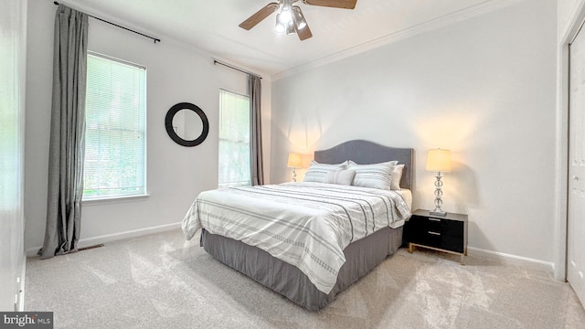 1009 Cadmus Dr, Fredericksburg, VA 22401 - carpeted bedroom with crown molding, baseboards, multiple windows, and ceiling fan