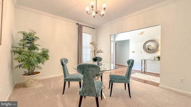 1009 Cadmus Dr, Fredericksburg, VA 22401 - dining area with ornamental molding, a chandelier, carpet flooring, and baseboards