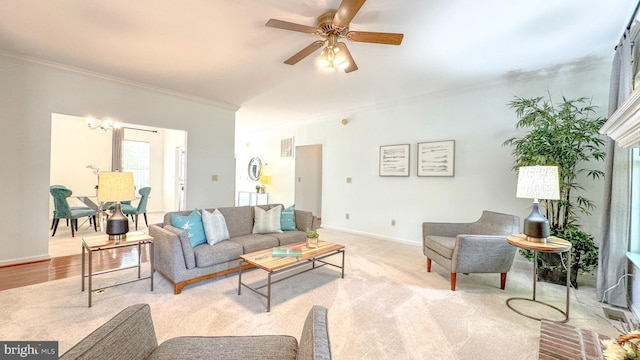 1009 Cadmus Dr, Fredericksburg, VA 22401 - living area featuring crown molding, a ceiling fan, and baseboards