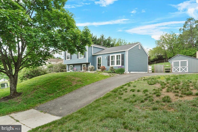 25112 Applecross Ter, Damascus, MD 20872 - tri-level home with an outbuilding, a front yard, and a storage shed