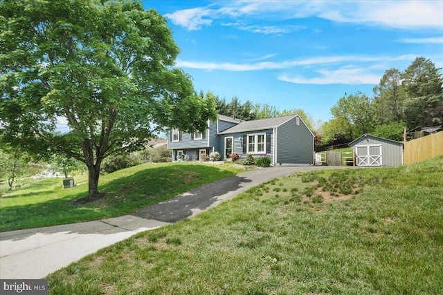 25112 Applecross Ter, Damascus, MD 20872 - tri-level home with a shed, an outbuilding, and a front lawn