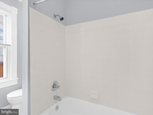 full bathroom featuring plenty of natural light,  shower combination, and toilet