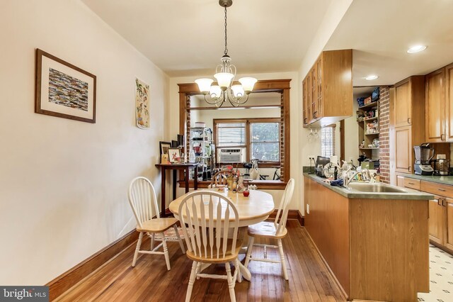 332 13th St SE, Washington, DC 20003 - dining space with baseboards, cooling unit, a notable chandelier, recessed lighting, and hardwood / wood-style floors
