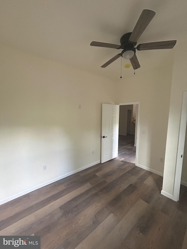 Meadow View Dr, Lost City, WV 26810 - unfurnished room with a ceiling fan, baseboards, and dark wood finished floors
