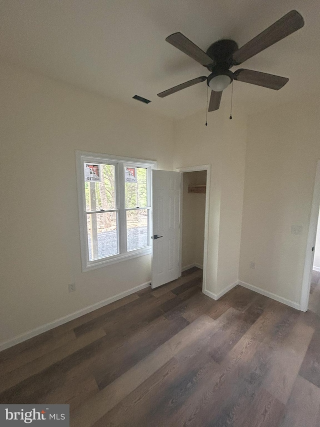 Meadow View Dr, Lost City, WV 26810 - unfurnished room featuring a ceiling fan, wood finished floors, and baseboards