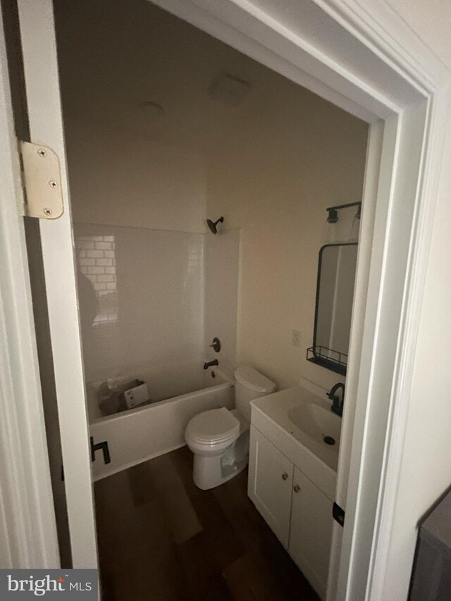 Meadow View Dr, Lost City, WV 26810 - full bath featuring toilet, vanity, wood finished floors, and tub / shower combination