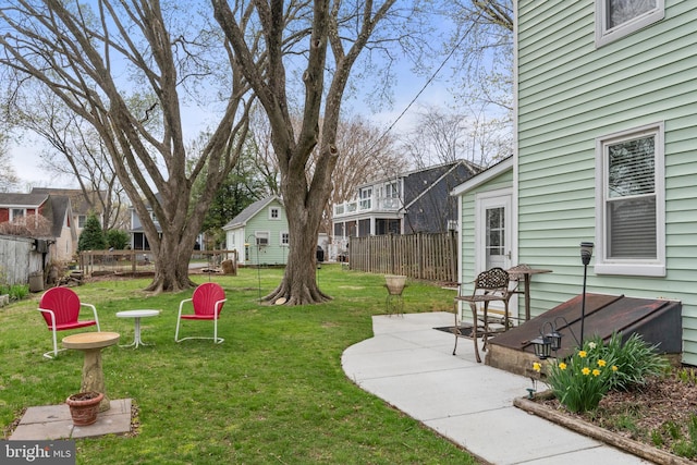 604 6th St, Annapolis, MD 21403 - view of yard with a patio area, fence, and a residential view