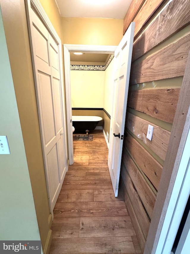hallway featuring wood finished floors