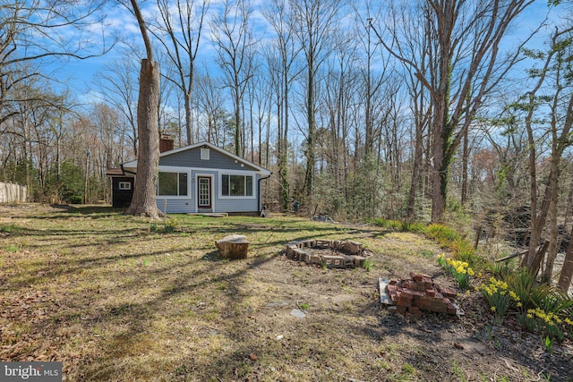 45352 Sypher Rd, California, MD 20619 - view of yard with an outdoor fire pit