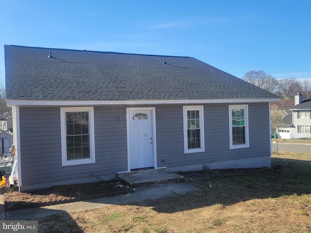 7601 Milligan Ln, Clinton, MD 20735 - rear view of property featuring roof with shingles