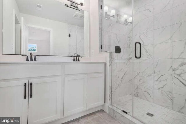 308 Alameda Pkwy, Arnold, MD 21012 - bathroom with double vanity, a sink, and a marble finish shower