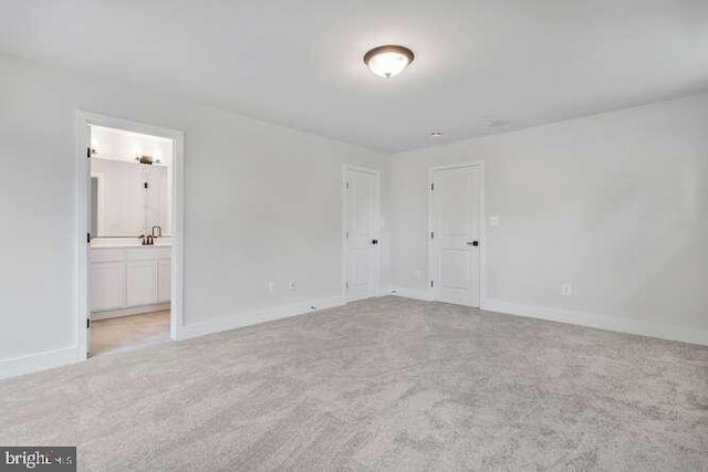 308 Alameda Pkwy, Arnold, MD 21012 - unfurnished bedroom featuring carpet floors, ensuite bathroom, and baseboards