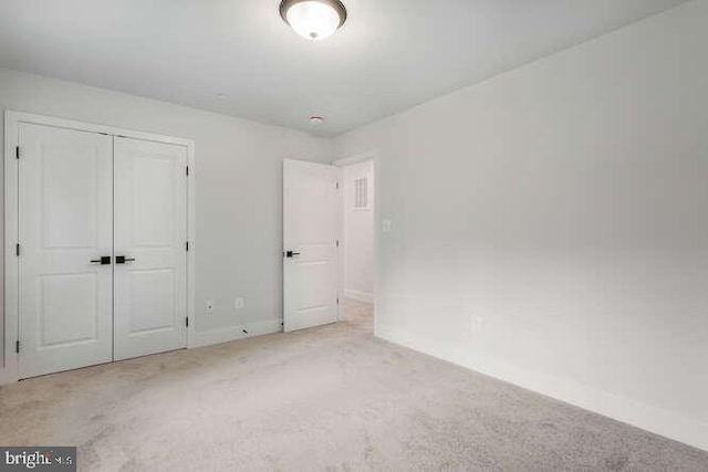 308 Alameda Pkwy, Arnold, MD 21012 - unfurnished bedroom with baseboards, a closet, and carpet flooring