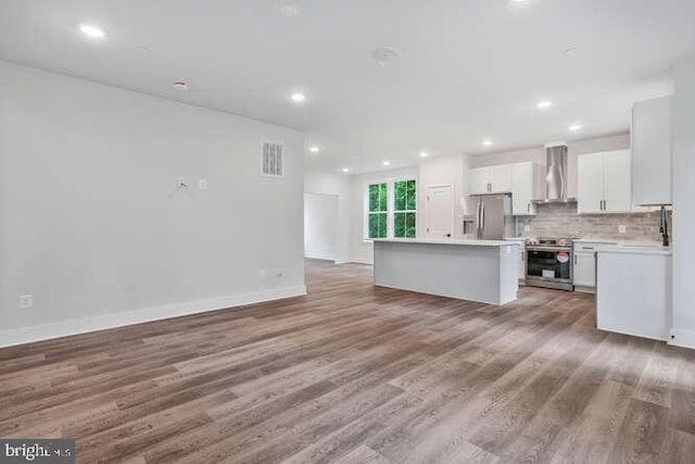 308 Alameda Pkwy, Arnold, MD 21012 - unfurnished living room featuring recessed lighting, baseboards, visible vents, and wood finished floors
